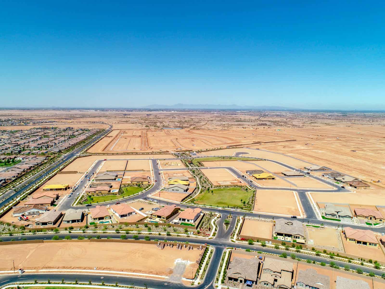 aerial photo looking over desert and residential properties in Arizona