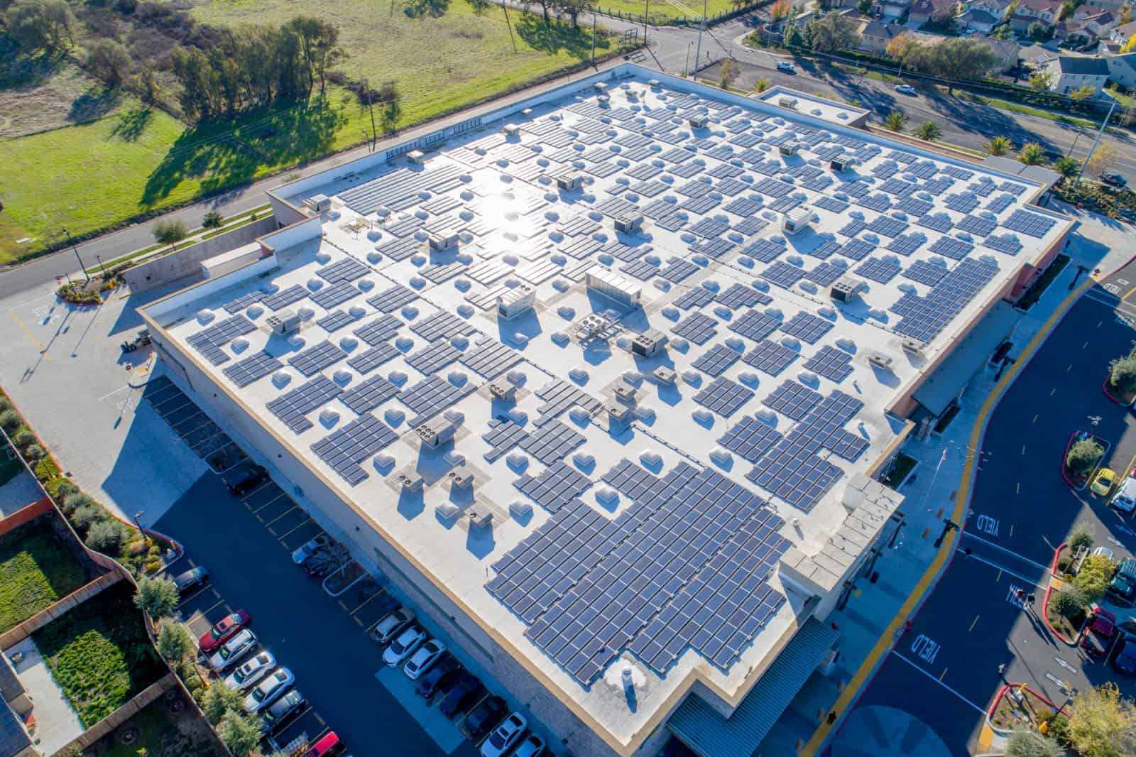 solar panel installation on roof of commercial real estate building