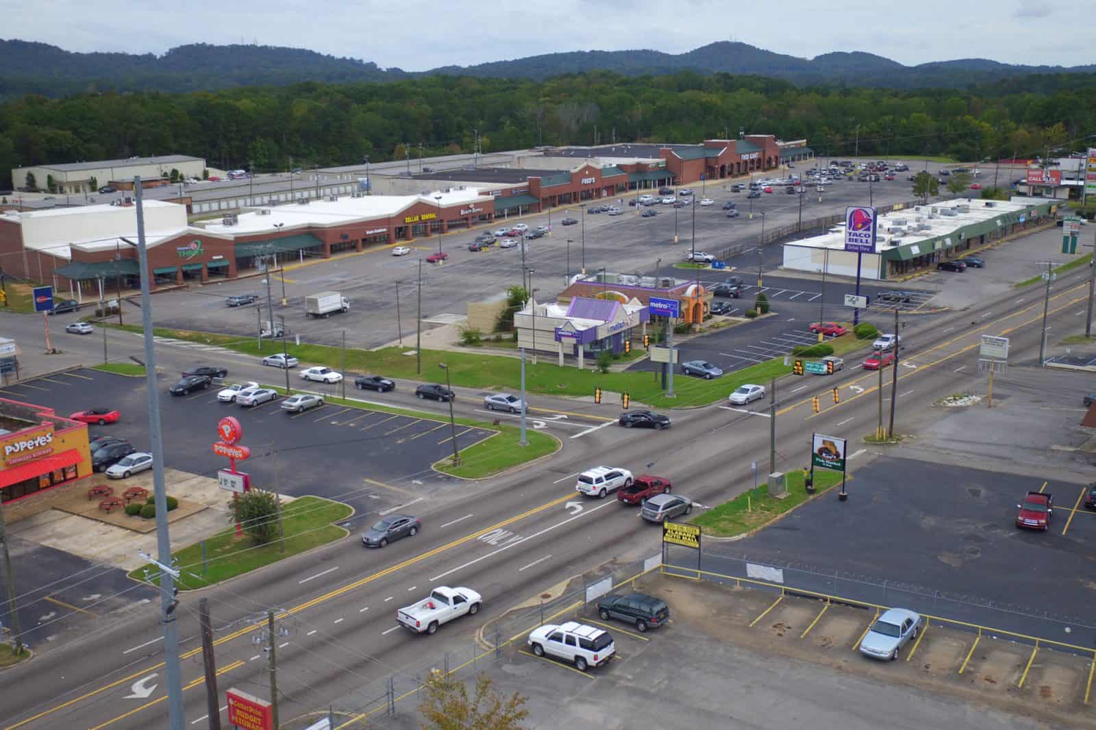 drone photo of shopping plaza and storefronts