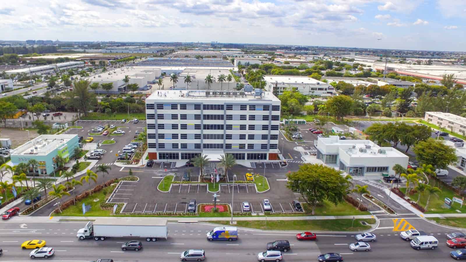 Aloft Miamia hotel front view next to highway taken from a drone