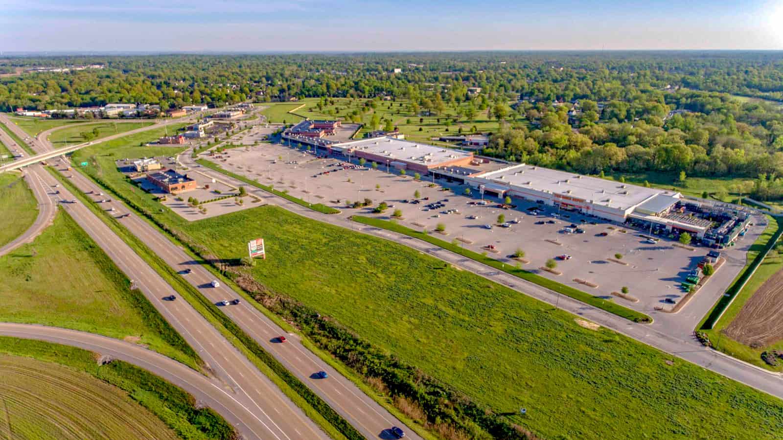 aerial photo of shopping plaza next to highway in Illinois