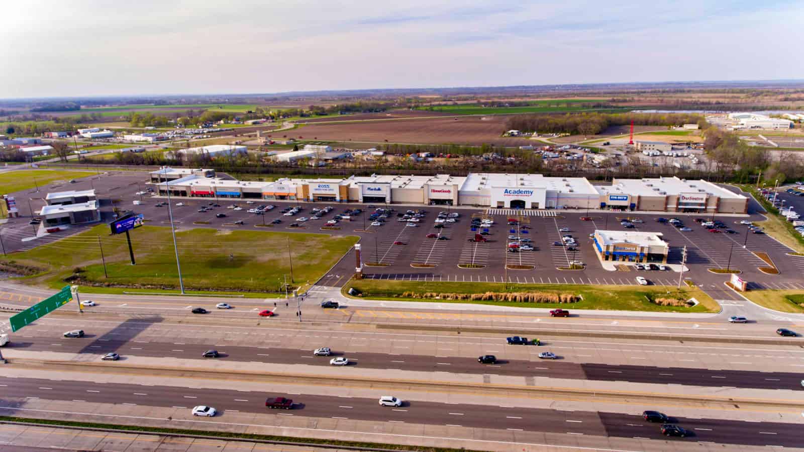 drone photo of shopping center in Missouri with Marshalls, Ross, and HomeGoods