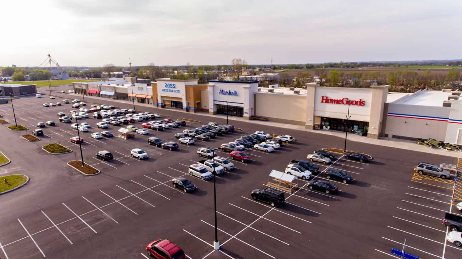 aerial drone photo of shopping plaza with Marshalls, HomeGoods, and Ross in Missouri