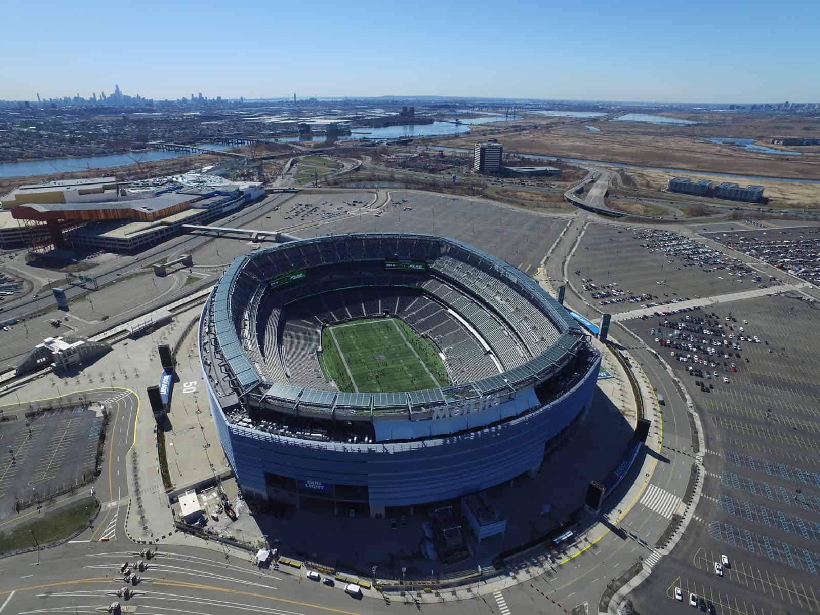 aerial drone photo of MetLife Stadium with New York City in background