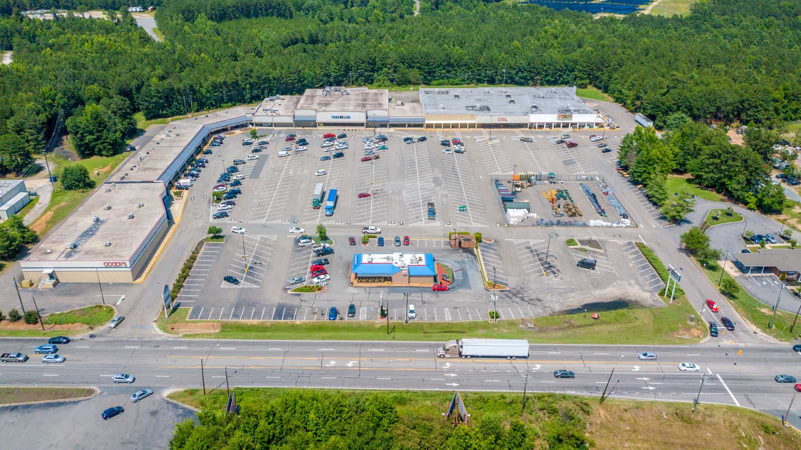 drone photo of shopping plaza with Food Lion in North Carolina
