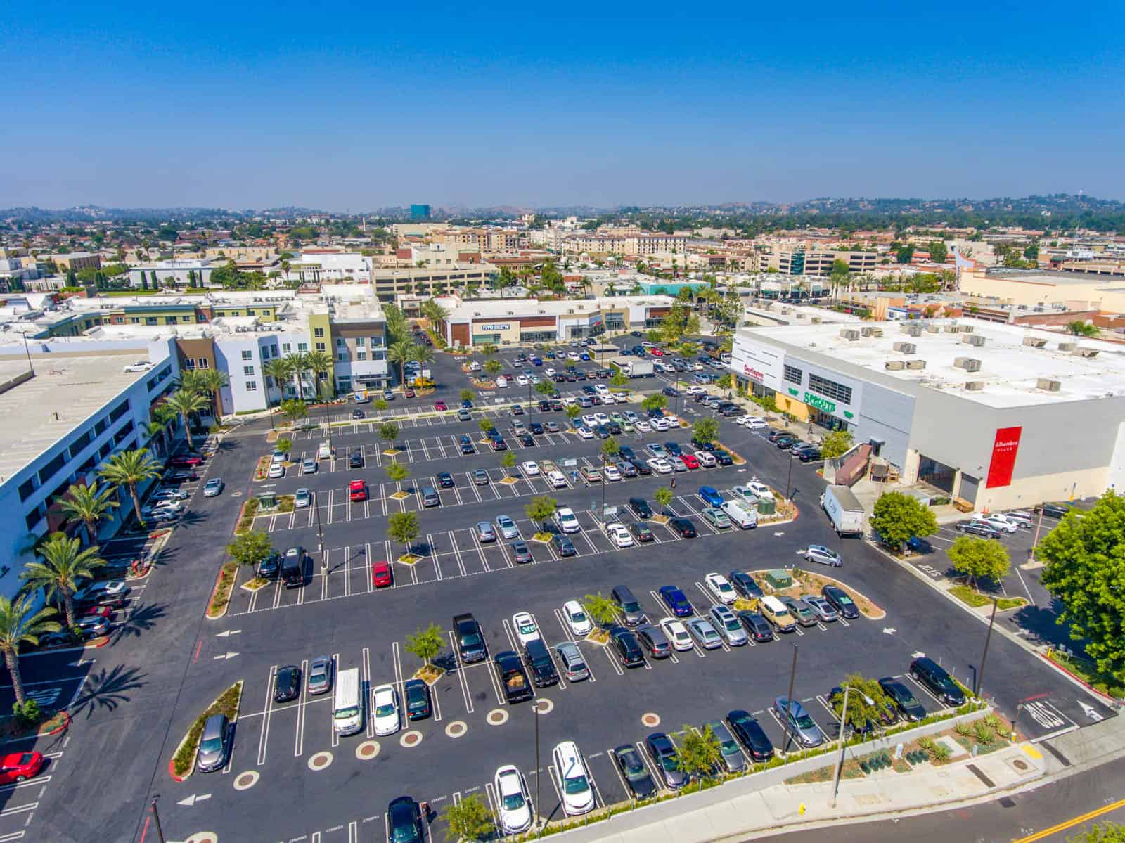 aerial drone photo of shopping plaza in California