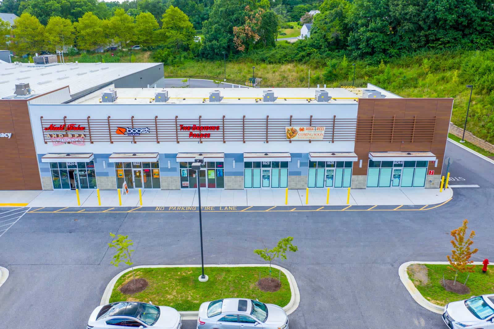 close up shot of storefronts in shopping center in Baltimore, Maryland taken by drone
